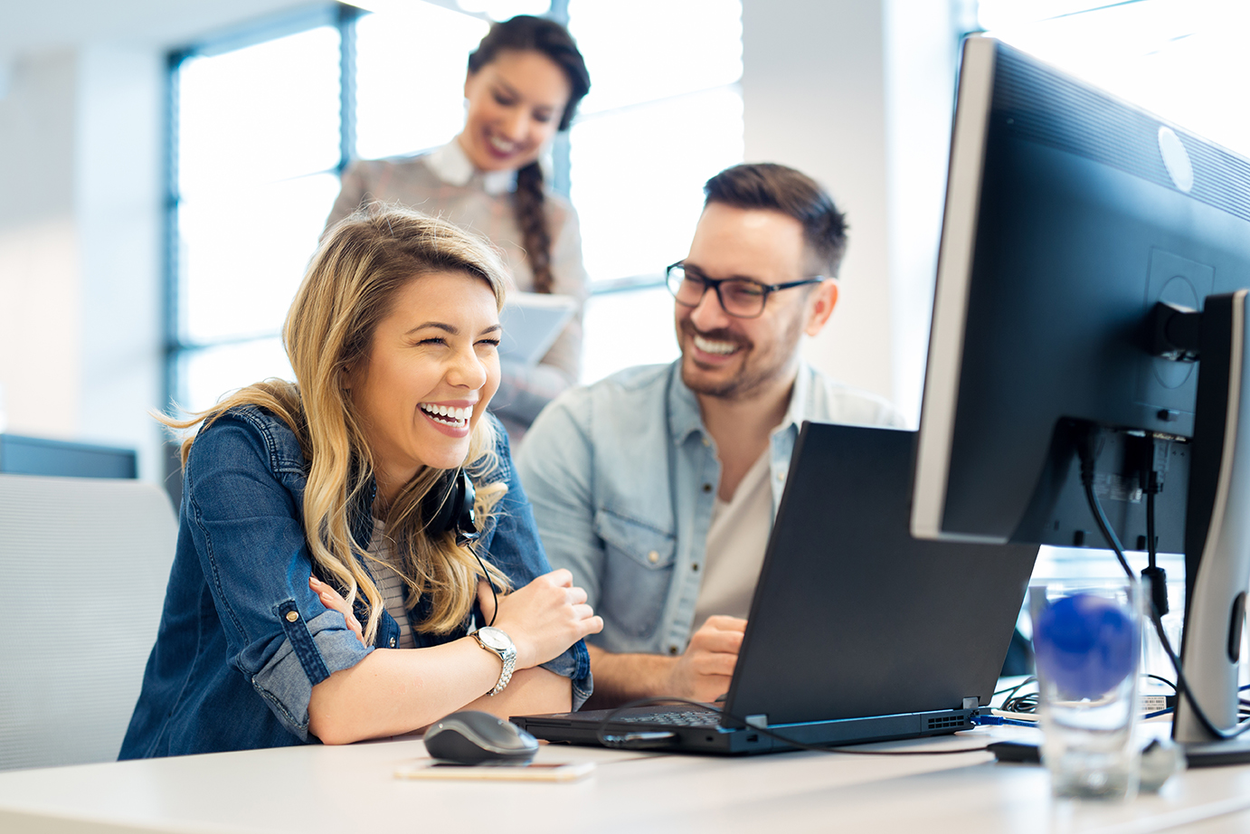 Group of business people and software developers working as a te